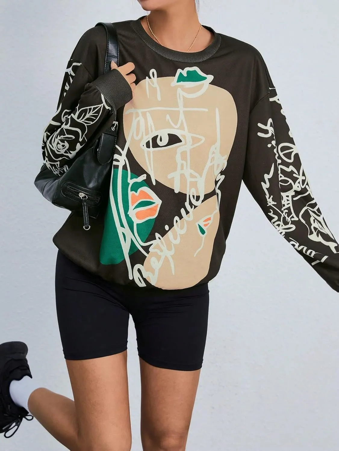 WDIRARA Women's Figure Graphic Print Sweatshirt Round Neck Long Sleeve Contrast Color Graffiti Pullovers