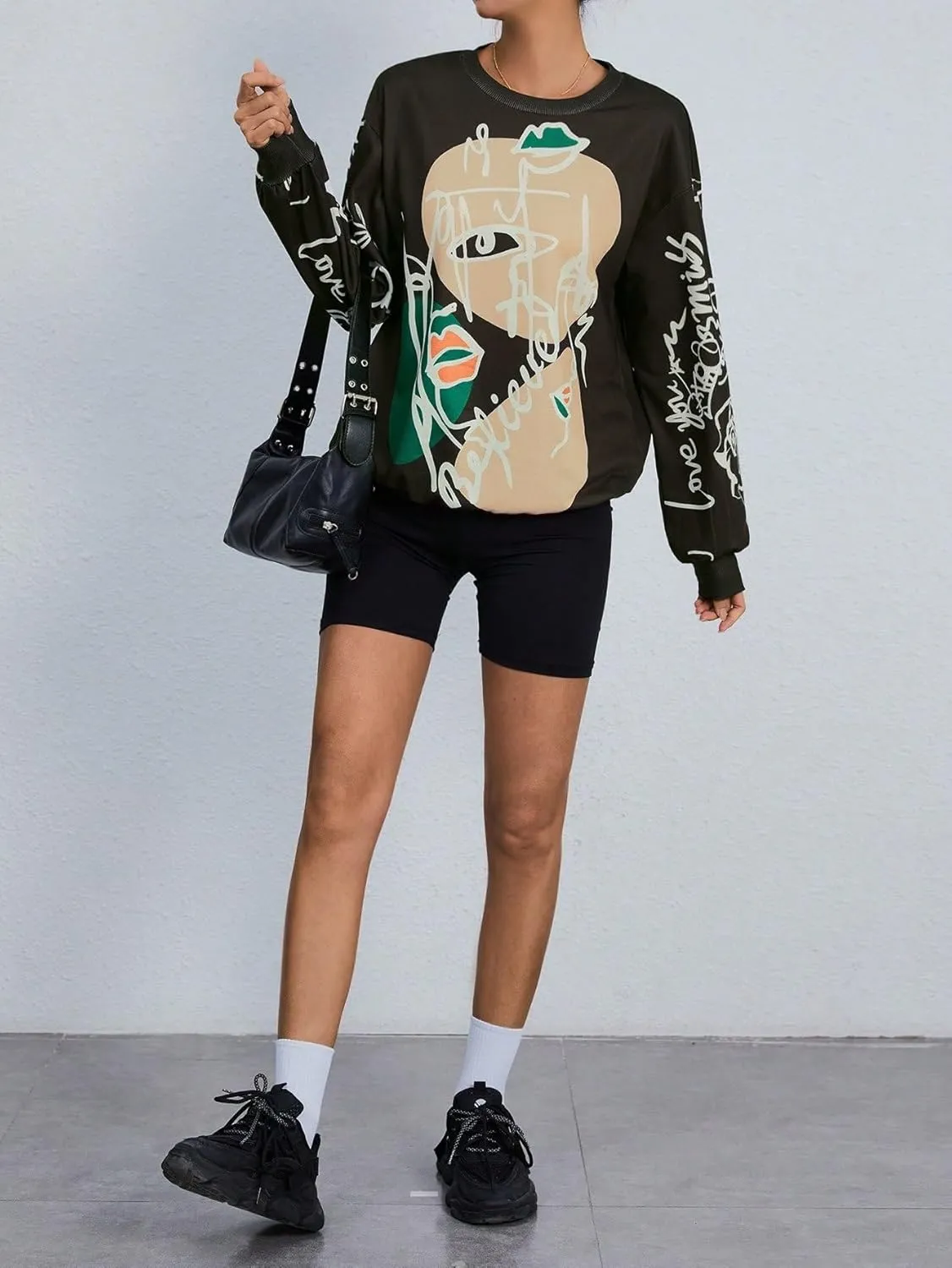 WDIRARA Women's Figure Graphic Print Sweatshirt Round Neck Long Sleeve Contrast Color Graffiti Pullovers