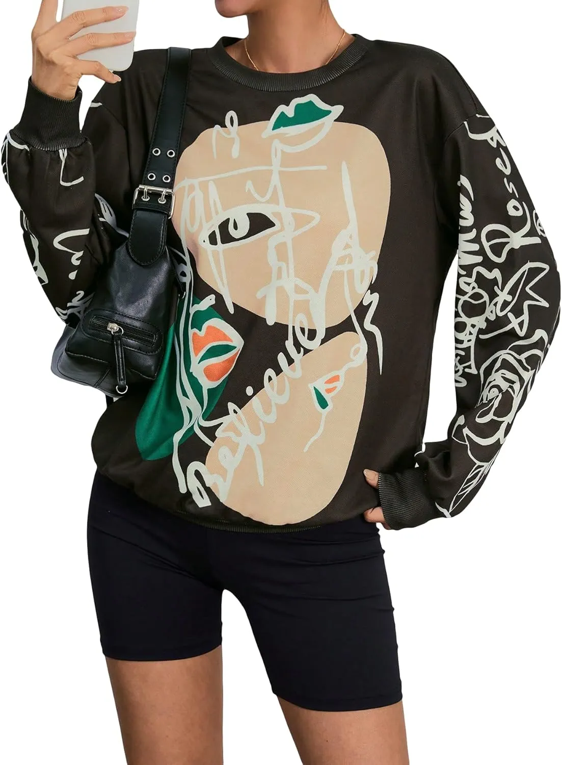WDIRARA Women's Figure Graphic Print Sweatshirt Round Neck Long Sleeve Contrast Color Graffiti Pullovers