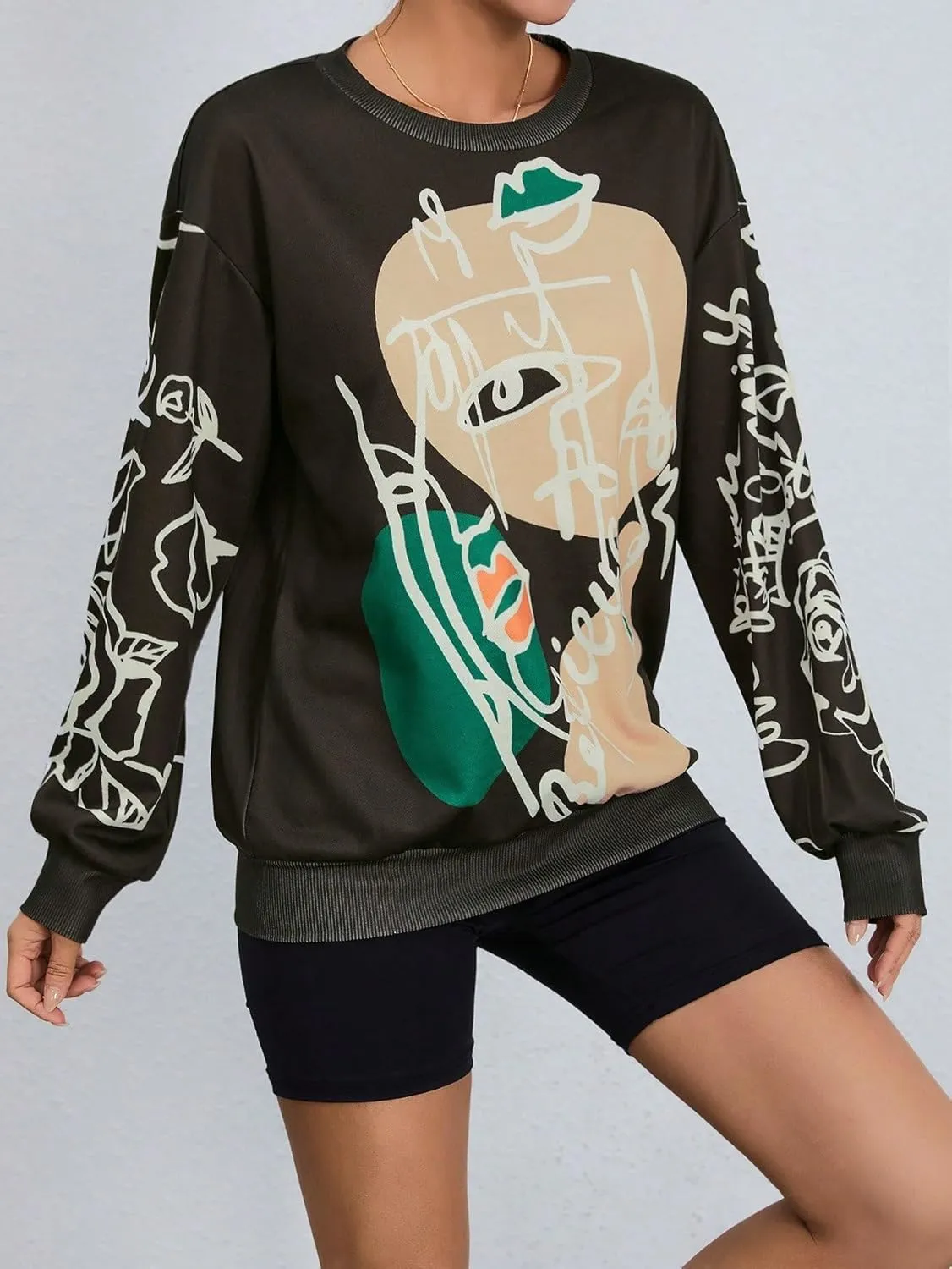 WDIRARA Women's Figure Graphic Print Sweatshirt Round Neck Long Sleeve Contrast Color Graffiti Pullovers