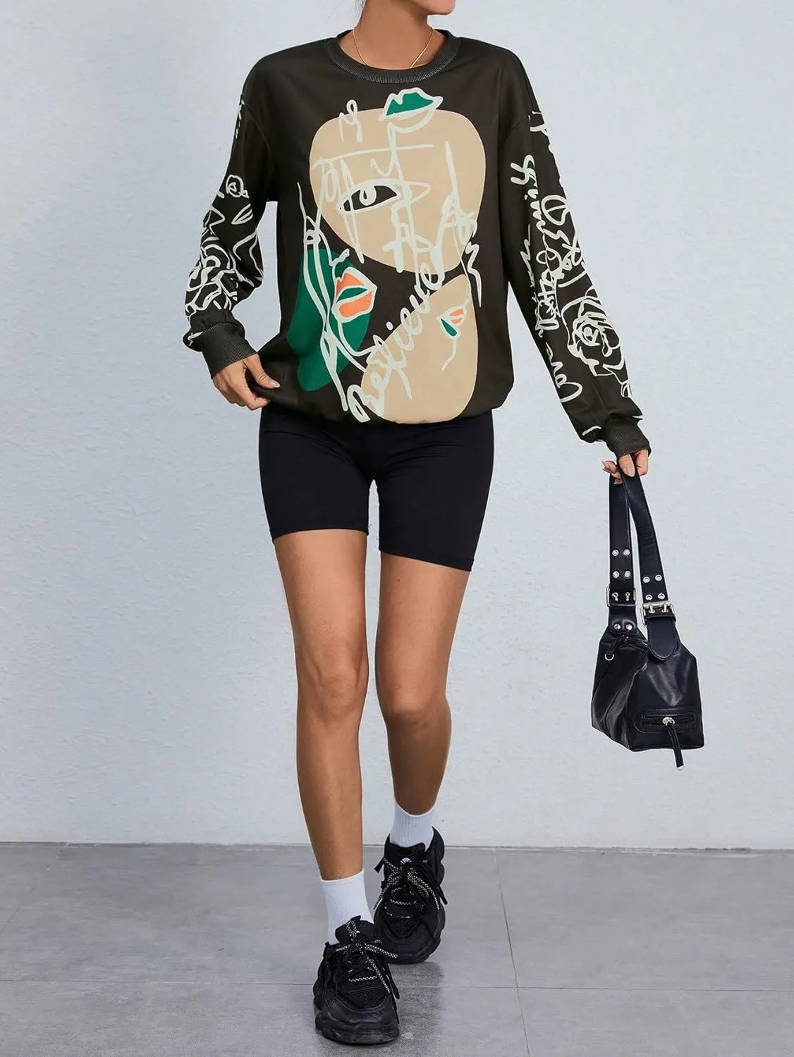 WDIRARA Women's Figure Graphic Print Sweatshirt Round Neck Long Sleeve Contrast Color Graffiti Pullovers